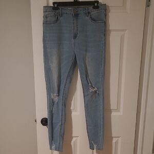 Women's Light Blue Distressed Jeans